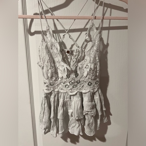 Free People Tops - Free people white lace type cutout tank top with layered design sz XS.